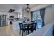 Dining area with a round table and chairs, open to the kitchen at 4443 E Bennington Ave, Castle Rock, CO 80104