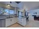 Kitchen with island, stainless steel appliances, and granite countertops at 4443 E Bennington Ave, Castle Rock, CO 80104