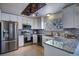 Modern kitchen with stainless steel appliances and granite countertops at 4443 E Bennington Ave, Castle Rock, CO 80104