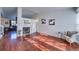 Living room with hardwood floors, a fireplace, and lots of natural light at 4443 E Bennington Ave, Castle Rock, CO 80104