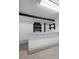 Basement bar featuring a granite counter and shelves at 6627 Eaton St, Arvada, CO 80003