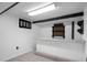 Basement bar featuring a granite counter and two shelves at 6627 Eaton St, Arvada, CO 80003