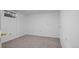 Bedroom featuring neutral carpet and bright white paint at 6627 Eaton St, Arvada, CO 80003