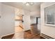 Bright dining area with wood flooring and views of the living room at 14590 E 2Nd Ave # 304B, Aurora, CO 80011