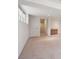Finished basement with carpet, window and sink at 6803 W Yale Ave, Lakewood, CO 80227