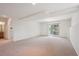 Finished basement with large sliding doors and natural light at 6803 W Yale Ave, Lakewood, CO 80227