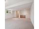 Finished basement space with natural light and a convenient wet bar area at 6803 W Yale Ave, Lakewood, CO 80227