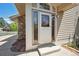 Inviting front entrance with glass accents and a well-maintained exterior at 6803 W Yale Ave, Lakewood, CO 80227