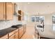 Modern kitchen featuring sleek countertops and modern stainless steel appliances at 2670 E 102Nd Pl, Thornton, CO 80229