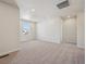 Bright, carpeted bedroom featuring recessed lighting, a large window, and neutral walls at 19088 E 94Th Pl, Commerce City, CO 80022