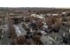 Aerial view of a residential neighborhood showcasing the density of homes, detached garages, and urban landscape at 374 S Lincoln St, Denver, CO 80209