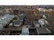 Aerial view of residential neighborhood with charming homes and detached garages at dusk, providing a sense of community at 374 S Lincoln St, Denver, CO 80209