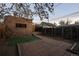 Backyard with brick patio and brick addition at 374 S Lincoln St, Denver, CO 80209