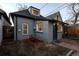 Back of house with small garden and brick addition at 374 S Lincoln St, Denver, CO 80209