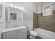 Bathroom with a shower and tub combination and modern fixtures at 374 S Lincoln St, Denver, CO 80209