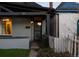 Charming entrance featuring a secure door and a well manicured lawn at 374 S Lincoln St, Denver, CO 80209