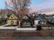 Charming street view of a collection of cozy single-Gathering homes with unique architectural details and curb appeal at 374 S Lincoln St, Denver, CO 80209