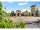 Beautifully landscaped exterior with stone accents and a distinctive tower feature at 2429 S Orchard St, Lakewood, CO 80228