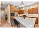 Modern kitchen features a large island with seating and stainless steel appliances at 2429 S Orchard St, Lakewood, CO 80228