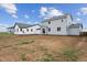 Large backyard with new construction homes, offering space for landscaping and outdoor living at 14400 Heritage Dr, Mead, CO 80504