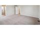 Spacious carpeted bedroom with neutral walls and natural light at 14400 Heritage Dr, Mead, CO 80504