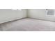 Spacious bedroom with neutral carpet and ample natural light at 14400 Heritage Dr, Mead, CO 80504