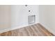 Laundry room with hard wood floors at 14400 Heritage Dr, Mead, CO 80504