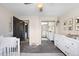 Cozy Bedroom with neutral decor, plush carpeting, and serene ambiance at 7371 Otis Ct, Arvada, CO 80003