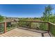 View from deck shows neighborhood and mature trees at 1905 Graphite Ct, Castle Rock, CO 80108