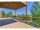 Large deck perfect for outdoor entertaining with overhead lights and a backyard view at 1905 Graphite Ct, Castle Rock, CO 80108
