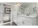 Modern bathroom with double vanity and separate toilet area at 1126 S Yampa St, Aurora, CO 80017