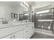 Double vanity bathroom with a large shower at 1126 S Yampa St, Aurora, CO 80017