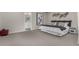 Main bedroom with large bed and ensuite bathroom at 1126 S Yampa St, Aurora, CO 80017