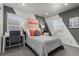 Bright bedroom with desk and gray bedding at 1126 S Yampa St, Aurora, CO 80017