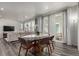 Open concept dining area with access to a back patio at 1126 S Yampa St, Aurora, CO 80017