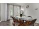 Dining area with table, chairs and curtains at 1126 S Yampa St, Aurora, CO 80017