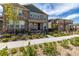 Charming two-story home with landscaped front yard and a welcoming entrance with stone accents at 1126 S Yampa St, Aurora, CO 80017