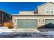 Two-car attached garage with automatic door opener at 1126 S Yampa St, Aurora, CO 80017