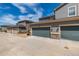 Three-car garage with ample parking space in a well-maintained community at 1126 S Yampa St, Aurora, CO 80017