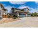 Three-car garage with ample parking space in a well-maintained community at 1126 S Yampa St, Aurora, CO 80017