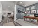 Home office with built-in shelving and a large desk at 1126 S Yampa St, Aurora, CO 80017