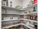 Well-organized pantry with ample shelving for storage at 1126 S Yampa St, Aurora, CO 80017