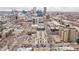 Stunning aerial view highlighting the building's urban location with city skyline in background at 975 N Lincoln St # 10A, Denver, CO 80203