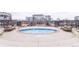 A rooftop hot tub with seating overlooks the surrounding cityscape at 975 N Lincoln St # 10A, Denver, CO 80203