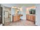 Bathroom with double vanity sinks, tile floors and walk in closet at 16333 Prairie Farm Cir, Parker, CO 80134