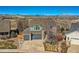 Beautiful two-story home with a well-manicured lawn, complemented by a two car garage and mountain views at 16333 Prairie Farm Cir, Parker, CO 80134