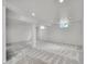Spacious finished basement area with neutral carpet and recessed lighting at 4670 E Euclid Cir, Centennial, CO 80121