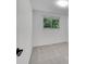 Bright bedroom with a window offering a view of lush greenery at 4670 E Euclid Cir, Centennial, CO 80121