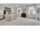 Bright primary bedroom with carpet, ample natural light, and traditional decor at 4670 E Euclid Cir, Centennial, CO 80121