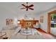Inviting living room with a cozy fireplace, comfortable seating, and backyard access at 4670 E Euclid Cir, Centennial, CO 80121